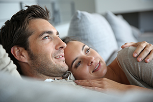 couple in bed reconnecting